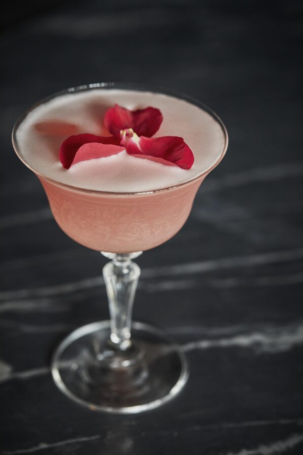 Luxury pink cocktail on black marble