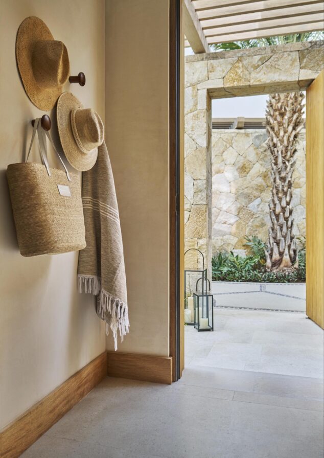 Entryway of Four Seasons Los Cabos casita with modern architecture view to outside stoned paved walkway