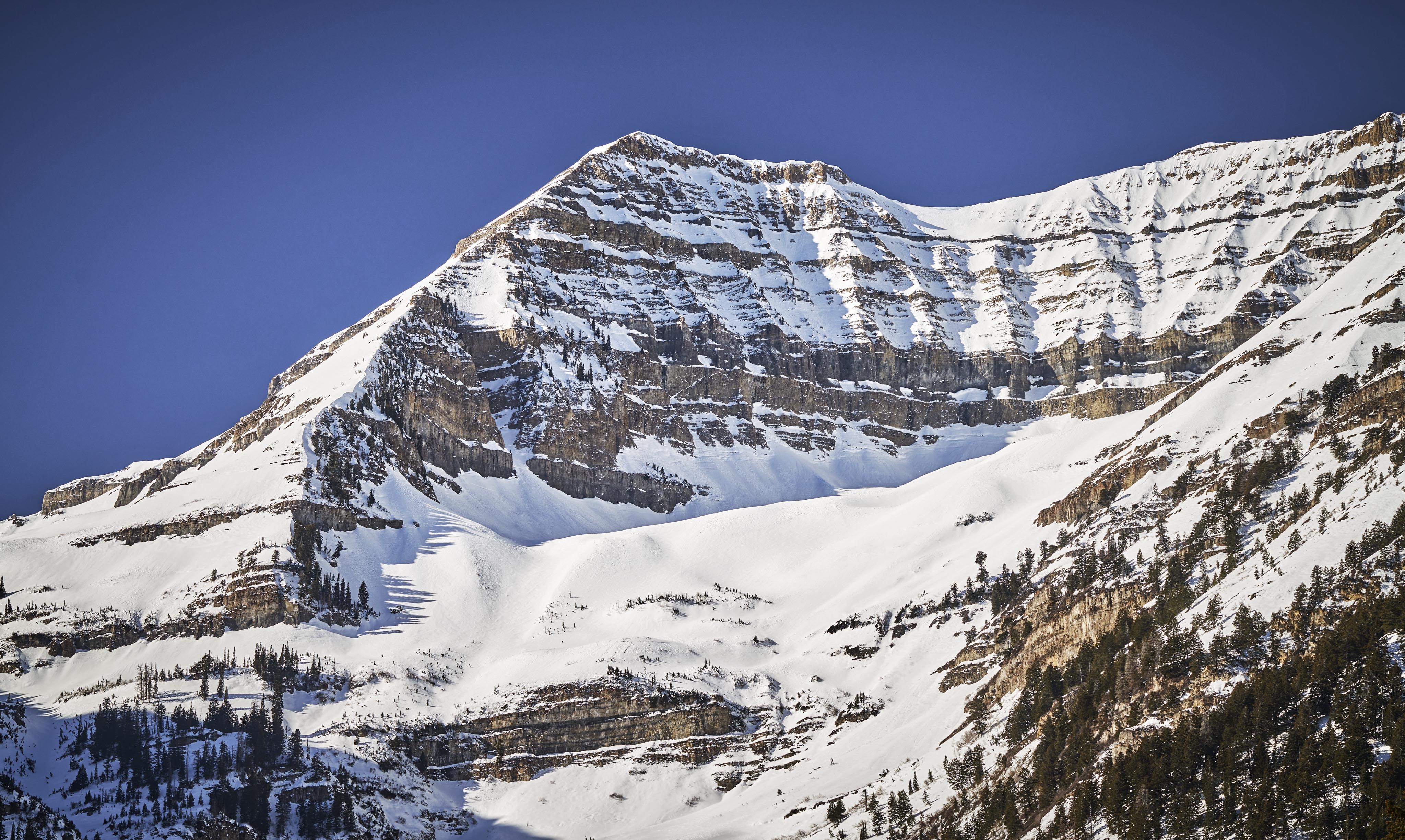 Park City snow covered rocky mountainside